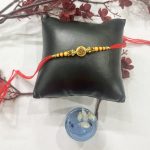 Fashion Mania Designer Om Symbol Round Shape Rakhi For Brothers